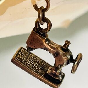 Vintage silver charm sewing machine